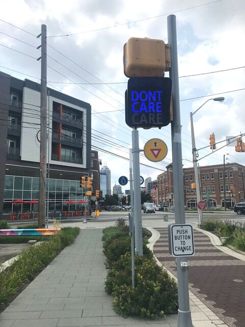 Care / Don't Care sign on Mass Ave, Indianapolis